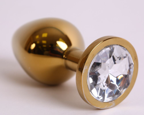 Золотистая анальная пробка с прозрачным кристаллом - 8,2 см. - 0
