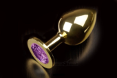 Большая золотая анальная пробка с закругленным кончиком и фиолетовым кристаллом - 9 см. - 0