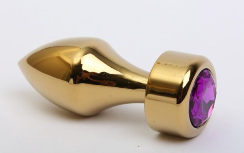 Золотистая анальная пробка с широким основанием и фиолетовым кристаллом - 7,8 см. - 0
